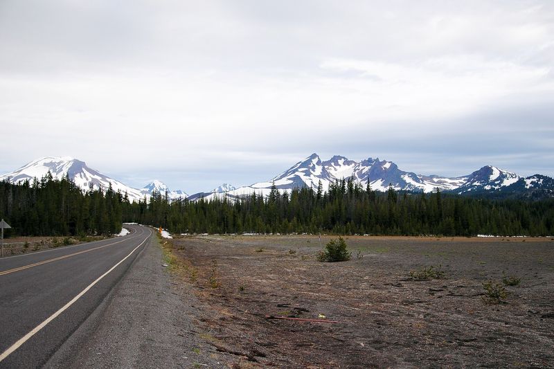 Cascade Lakes Highway leading toward snowy South Sister and Broken Top